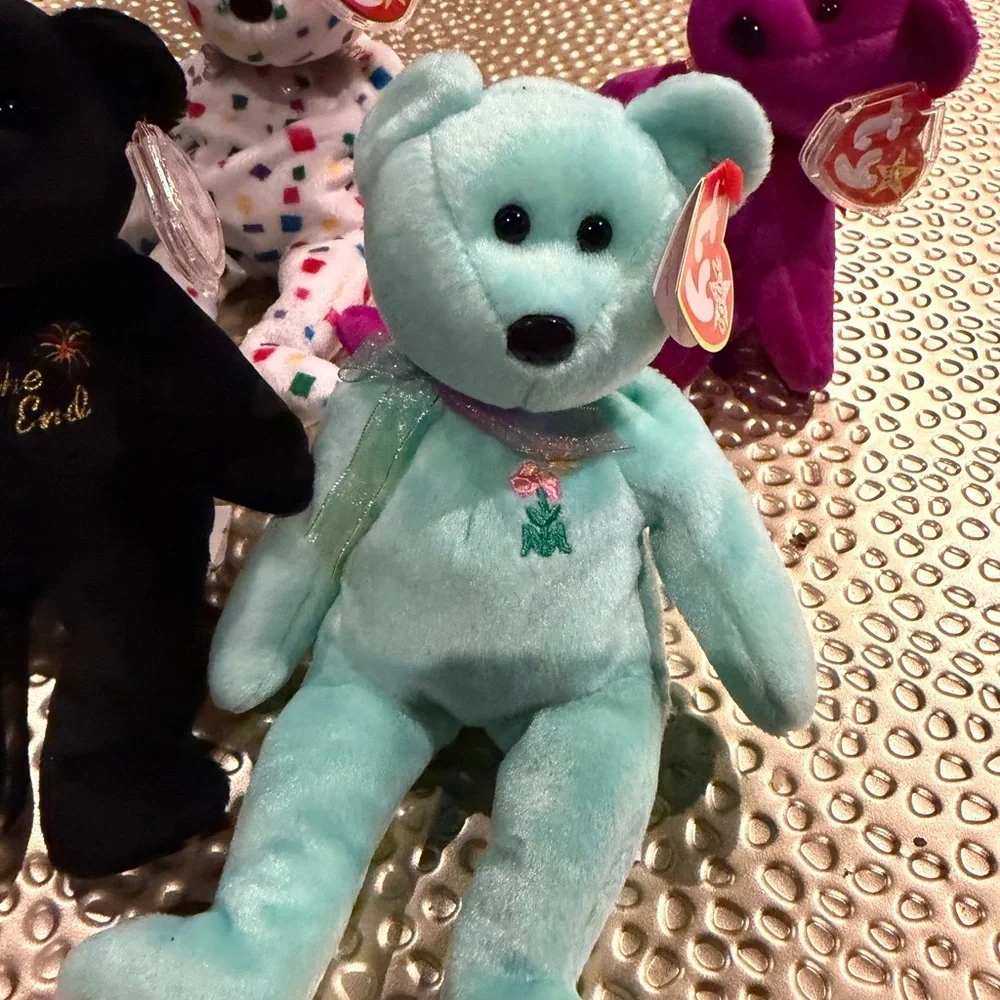 Ty Beanie Babies with tags ( Ariel, The End, y2k, and millennium beanie baby)